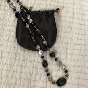 Beautiful black, grey and silver beaded necklace with jewelry bag